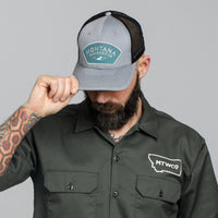 Trucker hat, snap back, gray/black. Free 5" logo sticker included.